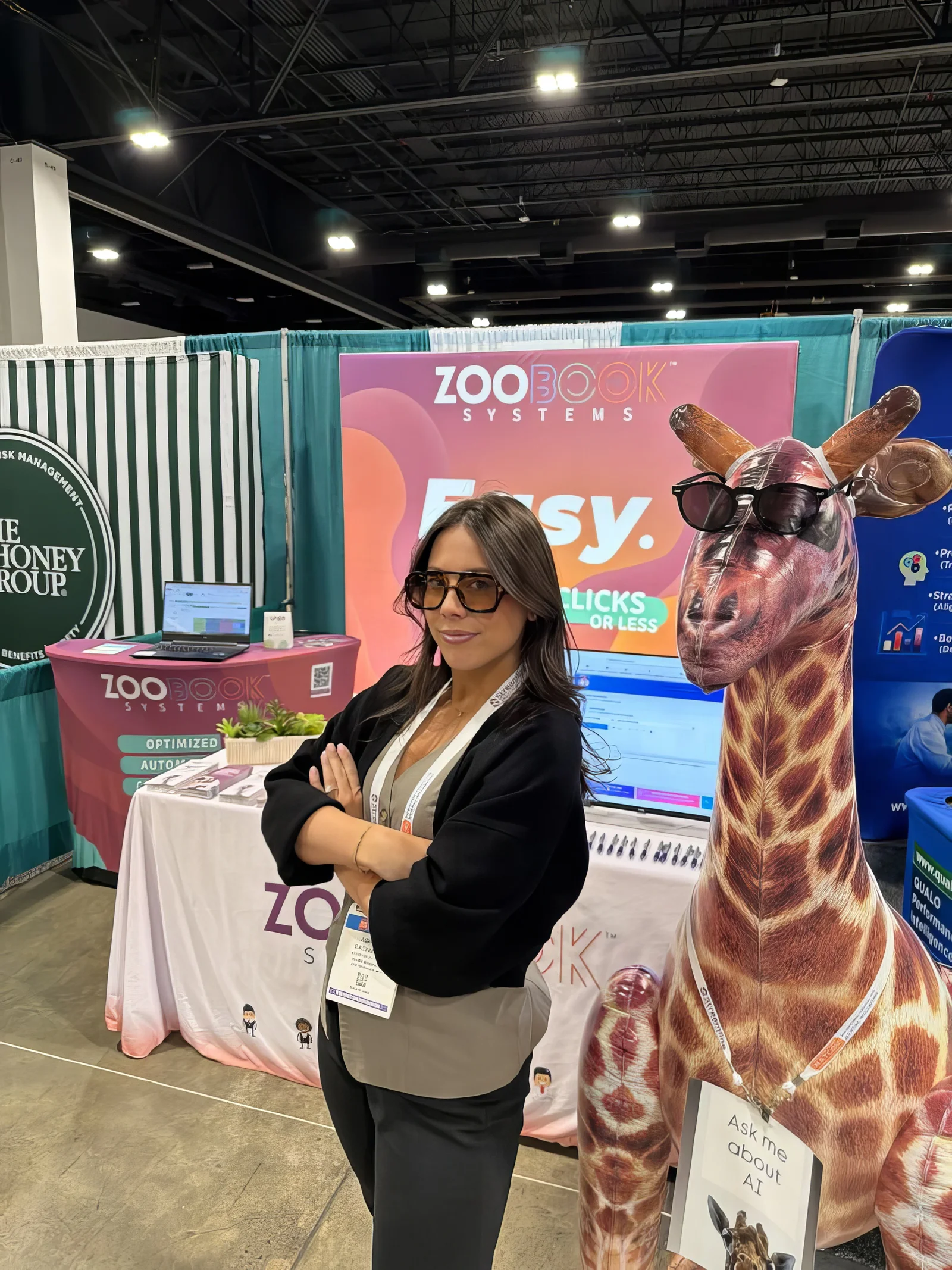 Zoobook Systems giraffe mascot at trade show