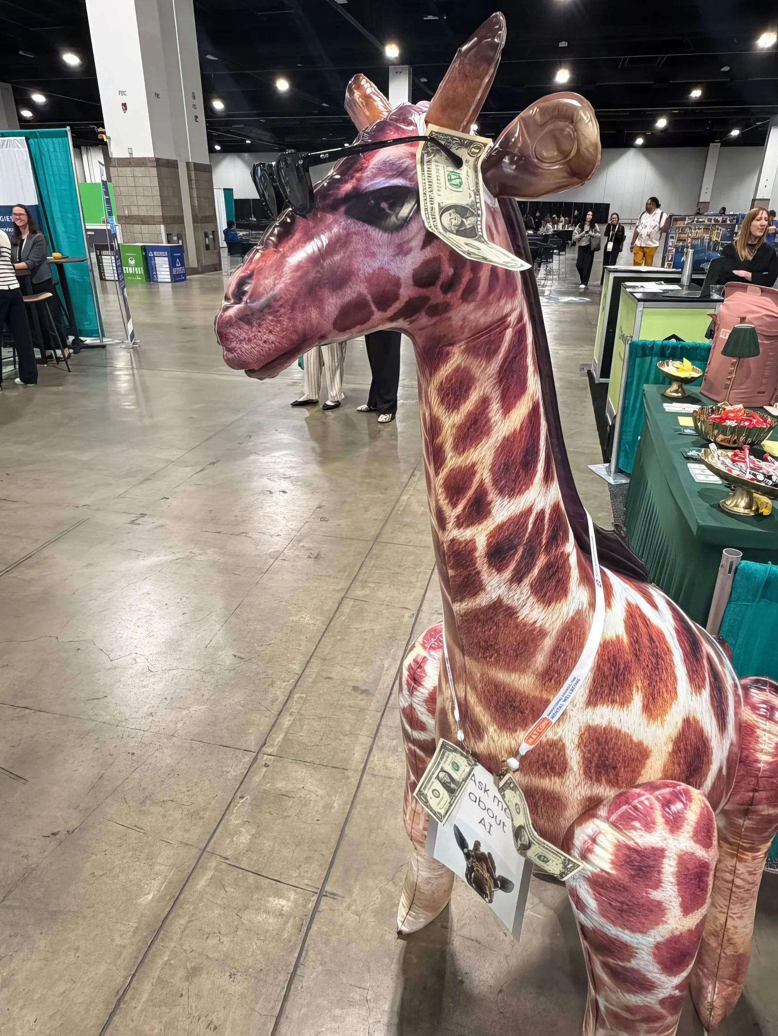 Zoobook giraffe mascot with dollar bills